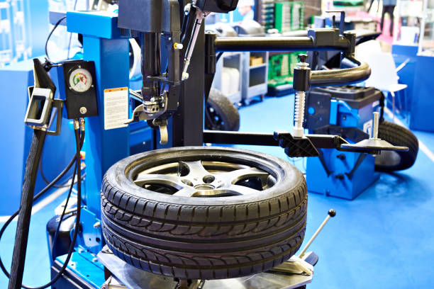 Conventional automatic tire changer in car service